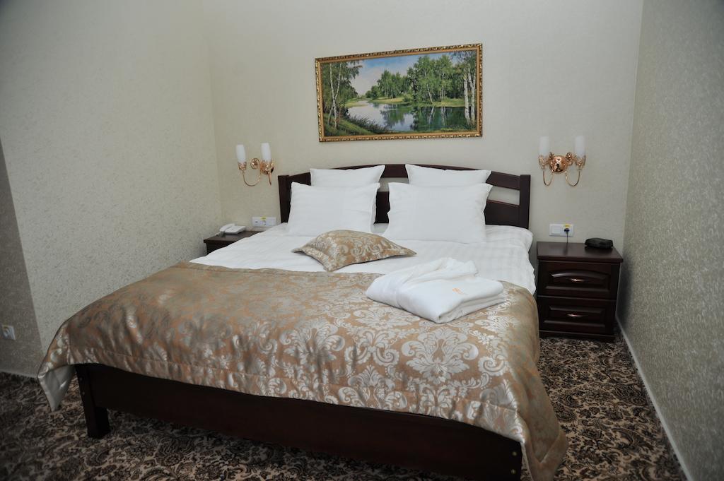 Slava Hotel Zaporizhia Habitación foto